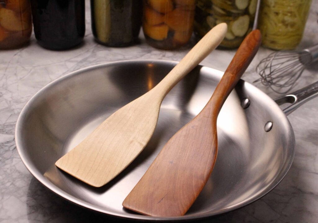 medium handmade wooden spatula for stirring and turning carved from Black Walnut wood.
