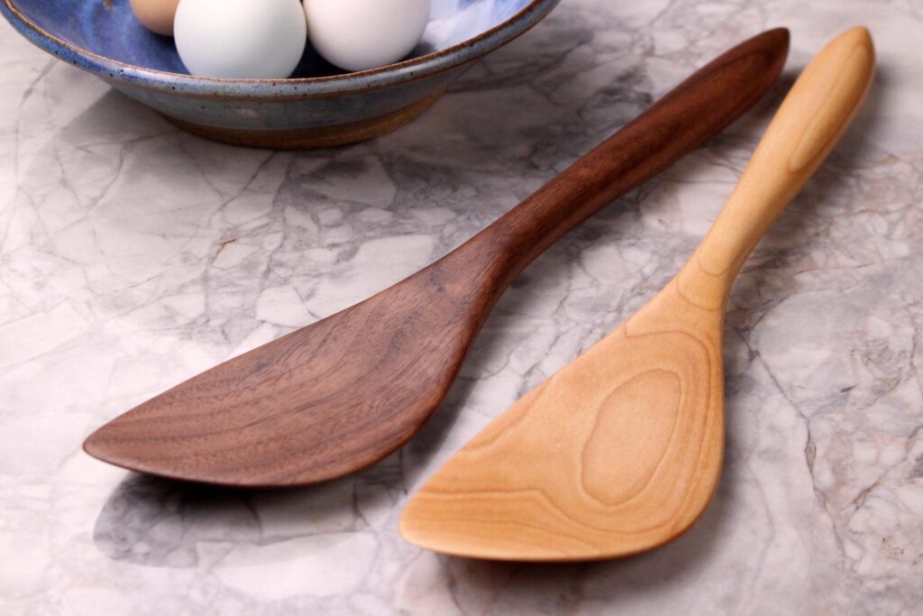Handmade wooden saute spurtle kitchen utensil of Walnut wood for stirring and mixing